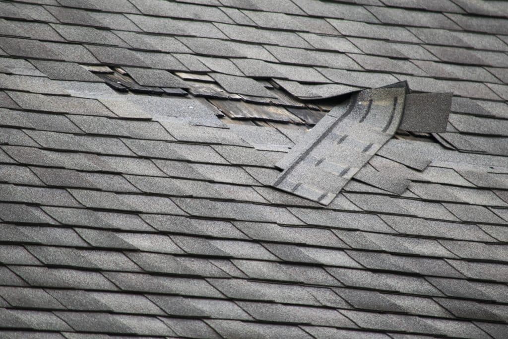 des moines area roofing missing shingle repair replacement